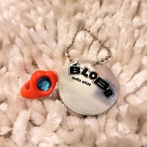 Sofia Elias Blobb Ring orange on blue